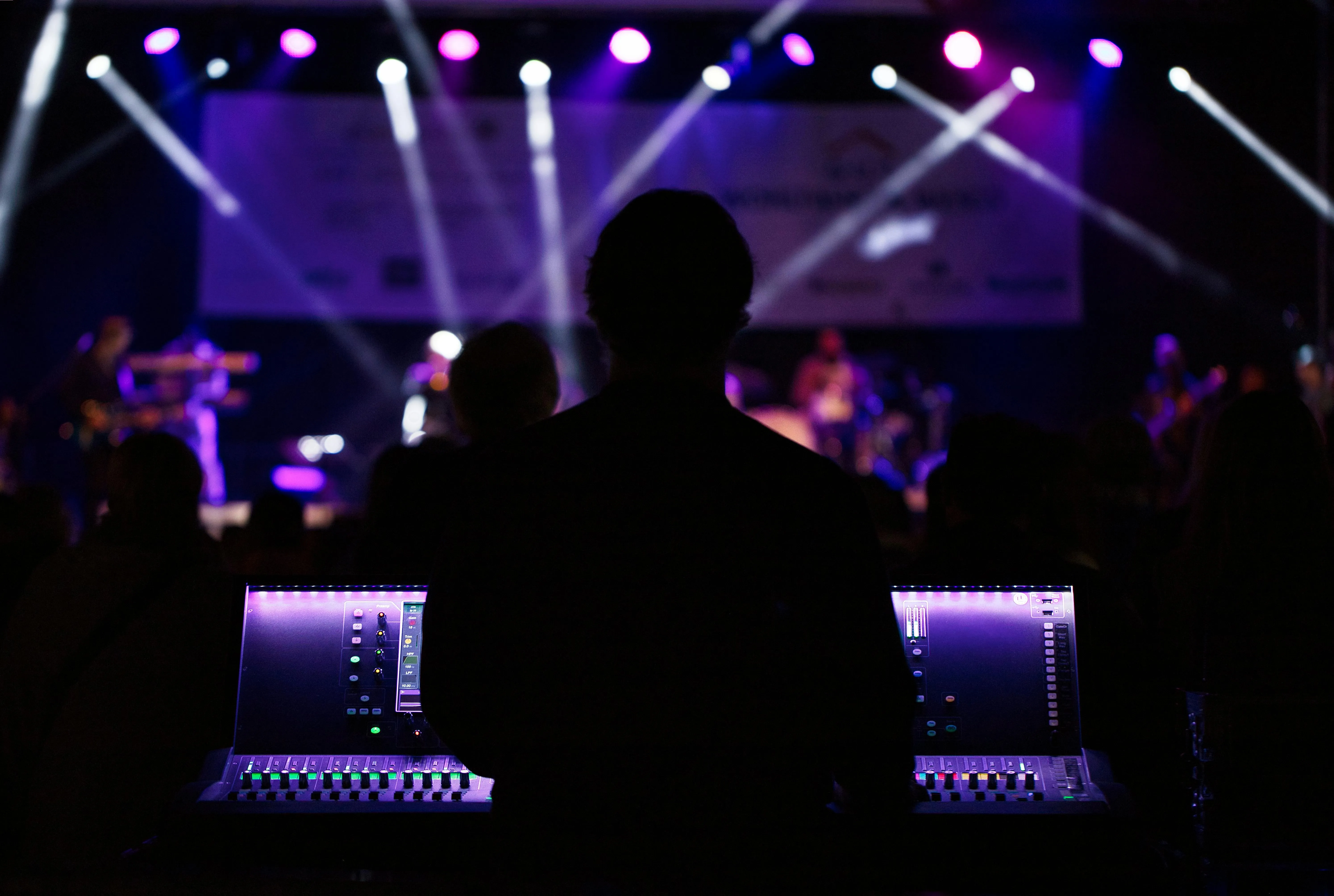 Event operator managing audio at a live production